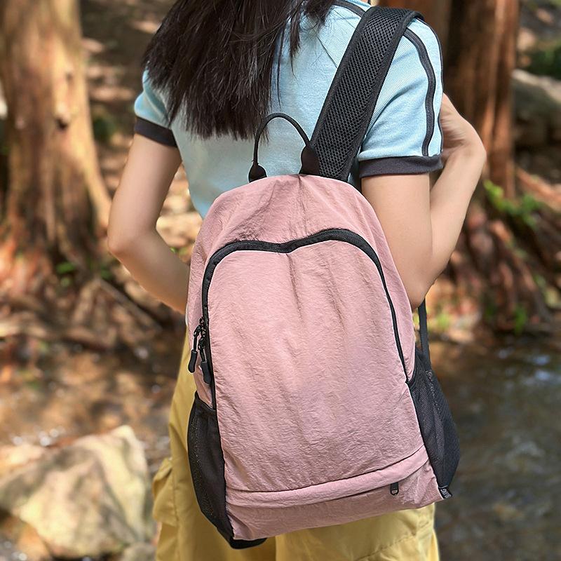 A Large Capacity Multi Functional Bag for Couples  A Lightweight Simple and Fashionable Travel Backpack