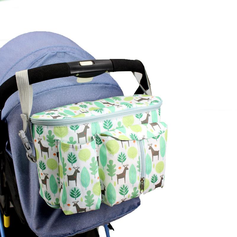 

Custom universal cartoon print hanging stroller organizer mummy diaper bag multi pockets baby stroller organizer with cup