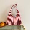 Retro Fashion Handbag Made Of Knit Cloth With Top Handle And Casual Design