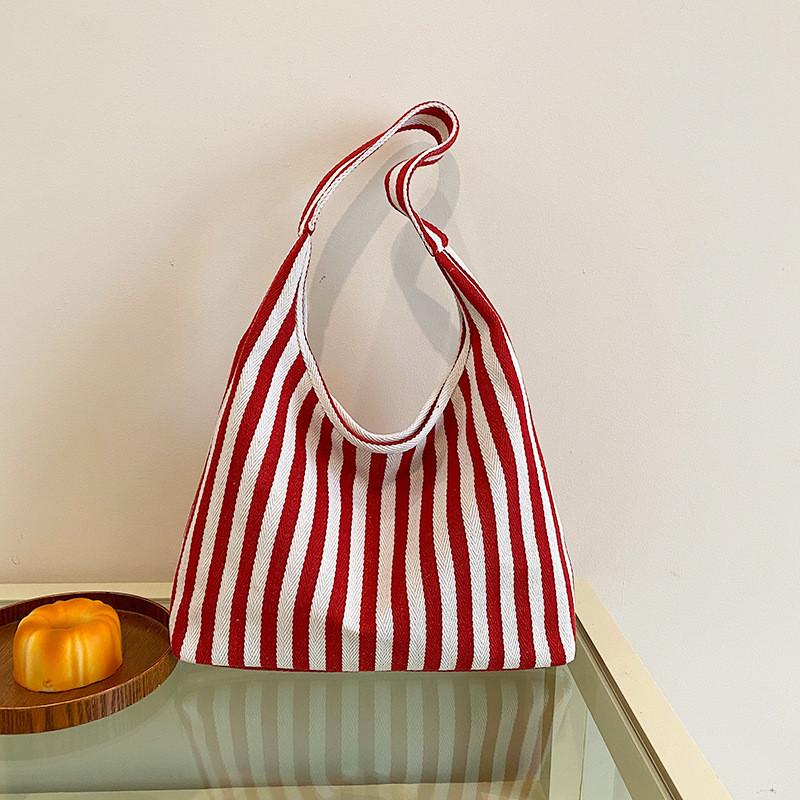Retro Fashion Handbag Made Of Knit Cloth With Top Handle And Casual Design