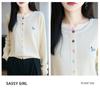 Elegant Round Neck Wool Cardigan with Eye-Catching Embroidery and Colorful Buttons, Perfect for Spring and Autumn Commutes.