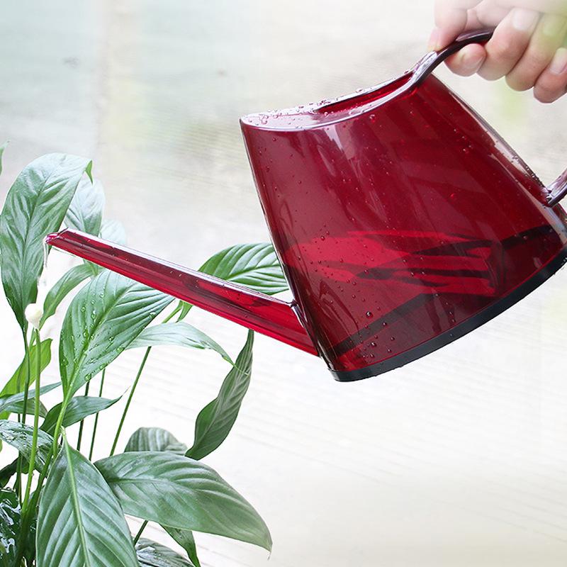 Long-Spout Transparent Watering Can for Gardens and Flowers, Colored Plastic, 2.5L Capacity.