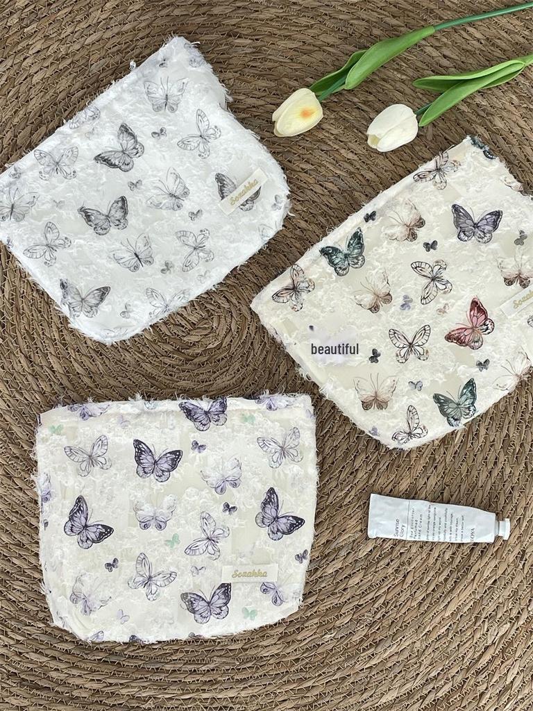 Super Hot Butterfly Cosmetic Bag: Large Capacity Portable Handbag with Stylish Design.