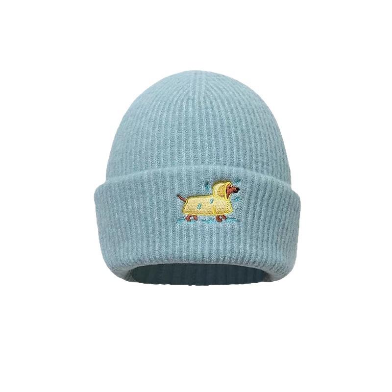 Embroidered Woolen Caps Are Cute for Children In Autumn and Winter. They Are Small Knitted Caps with Big Heads That Show Off Their Faces