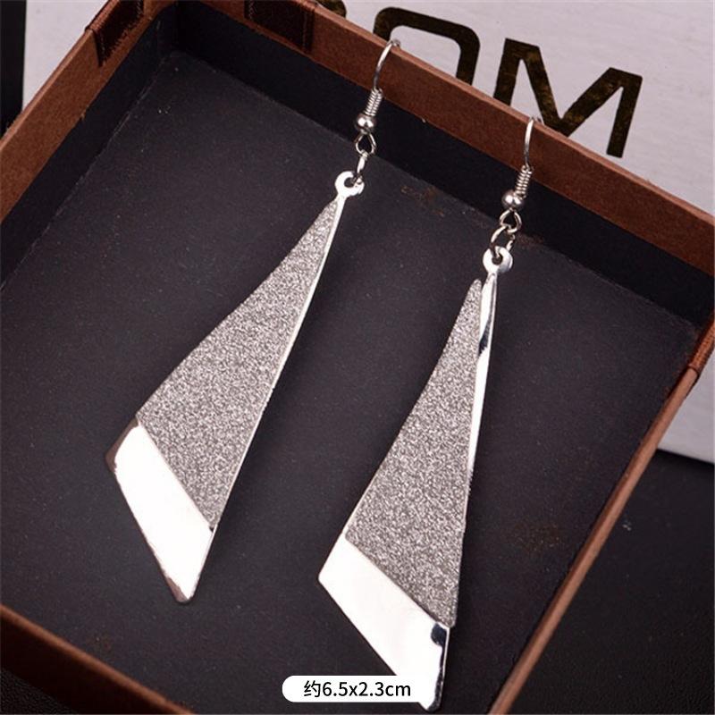 Fashion exaggerated niche temperament fringed earrings retro personality versatile sequined earrings women's long ear jewelry