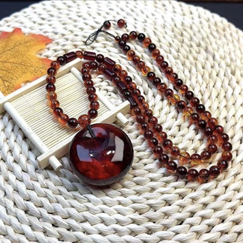 Bracelet polyvalent en Ambre Rouge Sang de Bœuf et Bambou avec Collier Pendentif Goutte d'Eau avec Design Bouddha Maitreya pour Hommes et Femmes