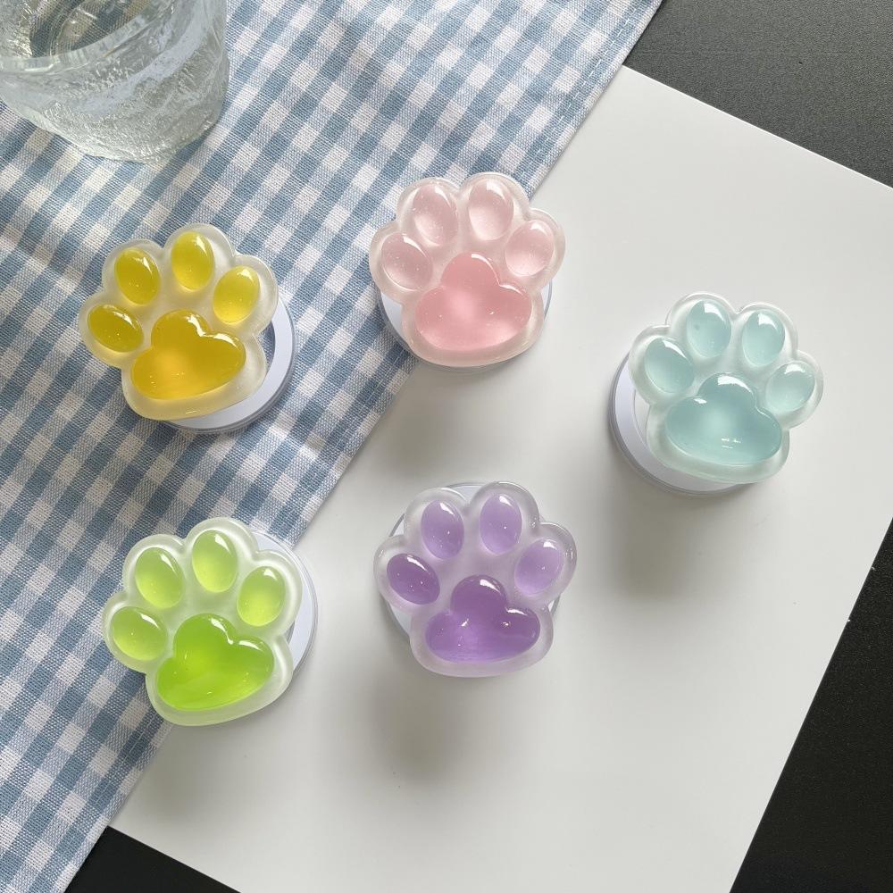 Colorful Glow-in-the-Dark Cat Paw Phone Air Cushion Stand, Magnetic Retractable Lazy Desktop Drama Watching Stand