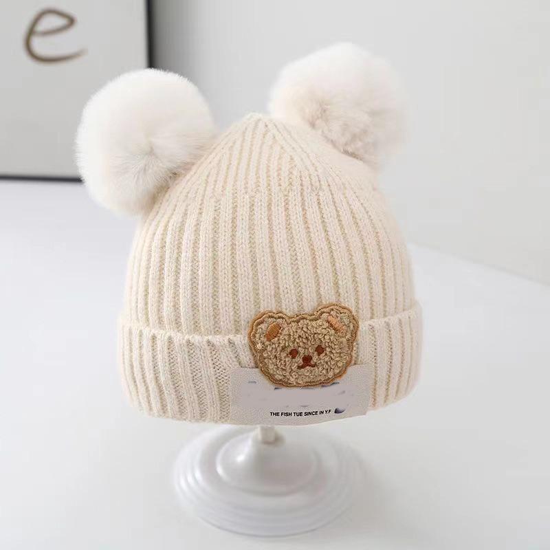 Cappellino invernale per neonato berretto a forma di orso coreano cappello invernale in lana a maglia per bambini berretto tinta unita cappello invernale per neonato con paraorecchie