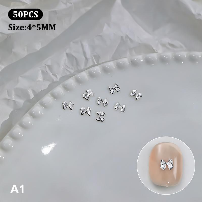 50 st Metalllegering Rosett Naglar Konst Dekoration Silver Guld Nagelberlocker DIY Manikyr Design Smyckestillbehör Verktyg