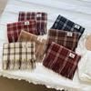Scarf women's autumn and winter atmosphere grid Korean versatile winter explosion new scarf thickened tassel to keep warm