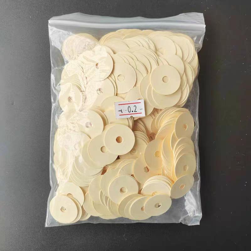 Piano accessories washers, key washers, paper washers, there are 1000 paper washers per pack.