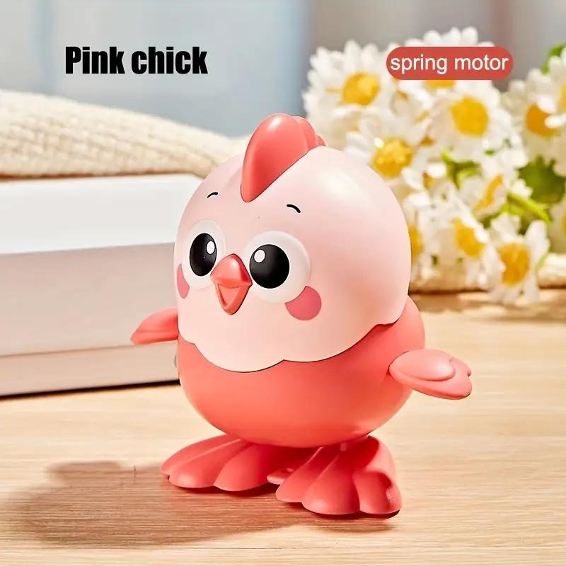 

1Pc Clockwork Chicken Jumping Toy Manual U Winding Jumping Doll Youngsters s Puzzle Animal Model Crawling Funny Toy Party Gift розовый