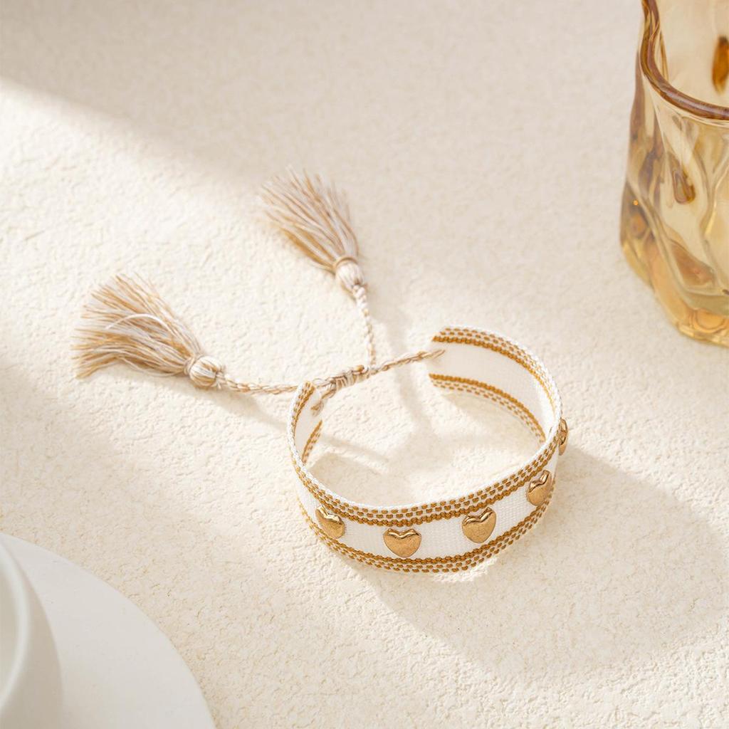 Gold Heart-Shaped Rivet Woven Friendship Bracelet with Tassel