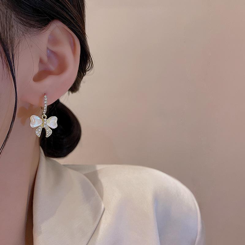 Elegant High-End Laser Bow Earrings with S925 Silver Needle and Sparkling Diamonds