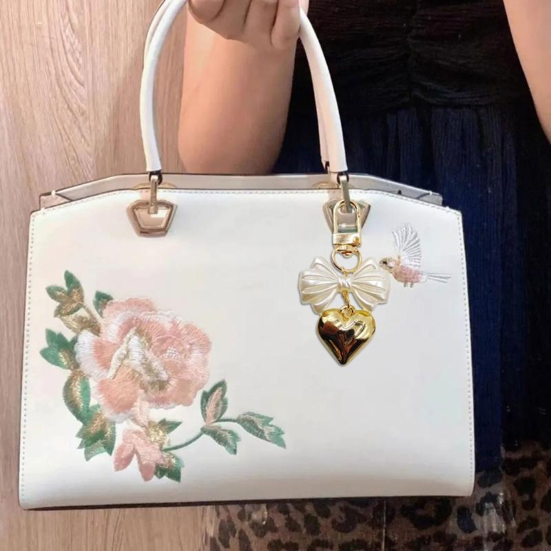 Schlüsselanhänger mit Herzanhänger und Schleife, Handy-Anhänger, abnehmbares Handy-Lanyard, handgefertigt, stilvoller Schmuck für Geldbörse und Tasche