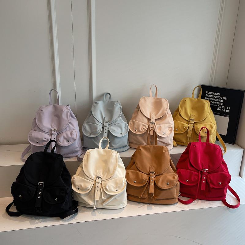 Solid color retro backpack women's 2025 new fashion travel leisure backpack double pocket college bag