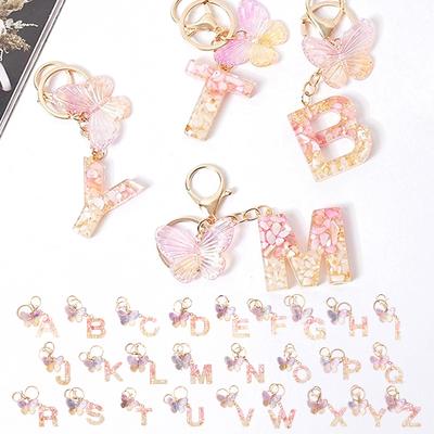 Pink Dream Butterfly 26 písmen A až Z Resin Keychain 26 Iniciály White Stone Gold Přívěsek na klíče Přívěsek na klíče Batoh Charm Bag Dekor