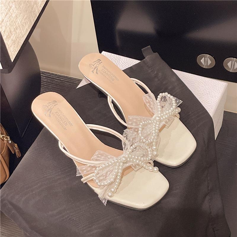 High-heeled slippers slim-heeled French retro half slippers 2025 new summer pearl bow one-pedal cool slippers