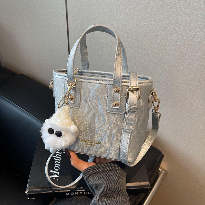 

Trendy Women s Off-White Silver Bucket Shoulder & Crossbody Bag 2025 серебряный