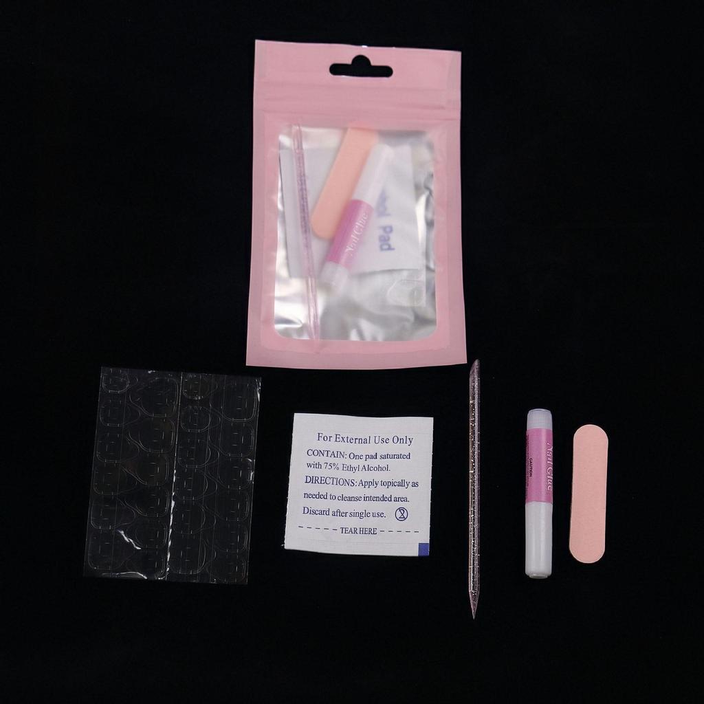 Wearable Nail Art Kit: Includes Double-Sided Jelly Glue, Nail File, and Alcohol Wipes.