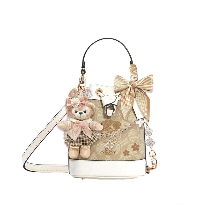 

COACH handbag [Customized bag] Dempsey 15 classic old flower cherry blossom extension detachable shoulder strap Pink shell apricot bucket basic style рожевий