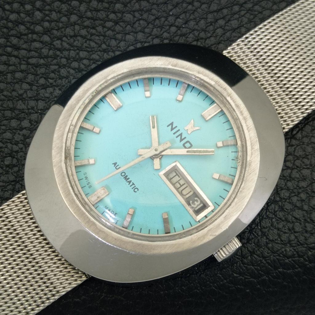VINTAGE NINO AUTOMATIC 2066 SWISS MENS SEA GREEN COLOR DIAL WATCH a703032-1