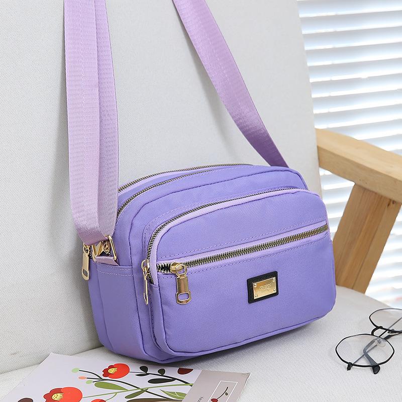 

Маленькая сумка Холщовая сумка Водонепроницаемая сумка через плечо Сумка для мам на одно плечо из ткани Оксфорд Женская сумка Повседневная многослойная фиолетовый