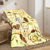 Yellow cartoon dog with brown beret surrounded by hearts and flowers. for all seasons blanket lunch break throw gift