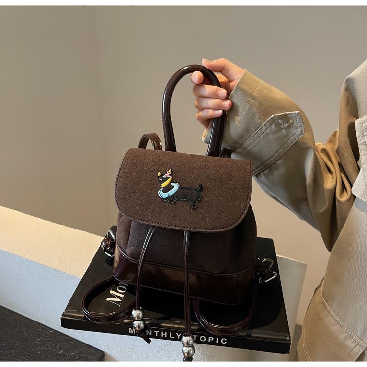 

Vintage college style backpack women s 2025 new Korean contrasting color niche portable bucket bag single shoulder backpack tide темно-коричневого