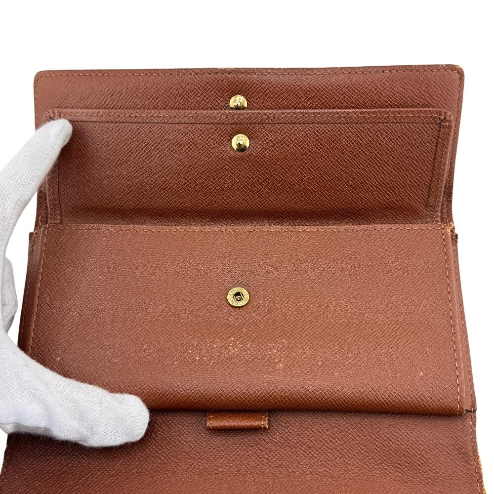 LOUIS VUITTON M61215 Monogram leather Portefeuille International Purse Sunburn leather Women Used