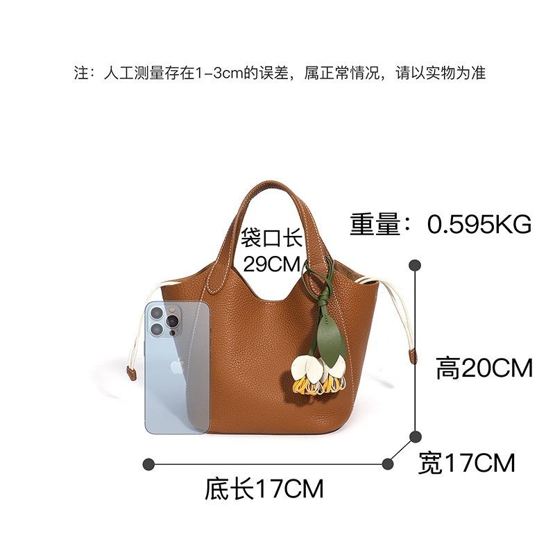 Bolso de mujer de piel de vaca de primera capa, bolso de hombro casual y simple, bolso cruzado de cuero con sensación de nicho, bolsa tipo cesta de verduras de cuero