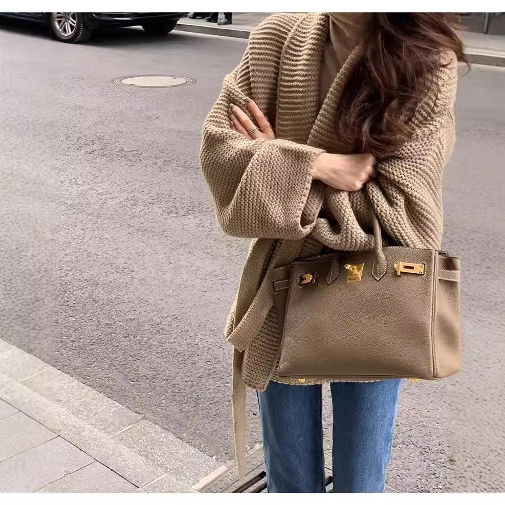 Lace-up sweater jacket women's autumn and winter new French design sense loose lazy style thin V-neck knitted cardigan women