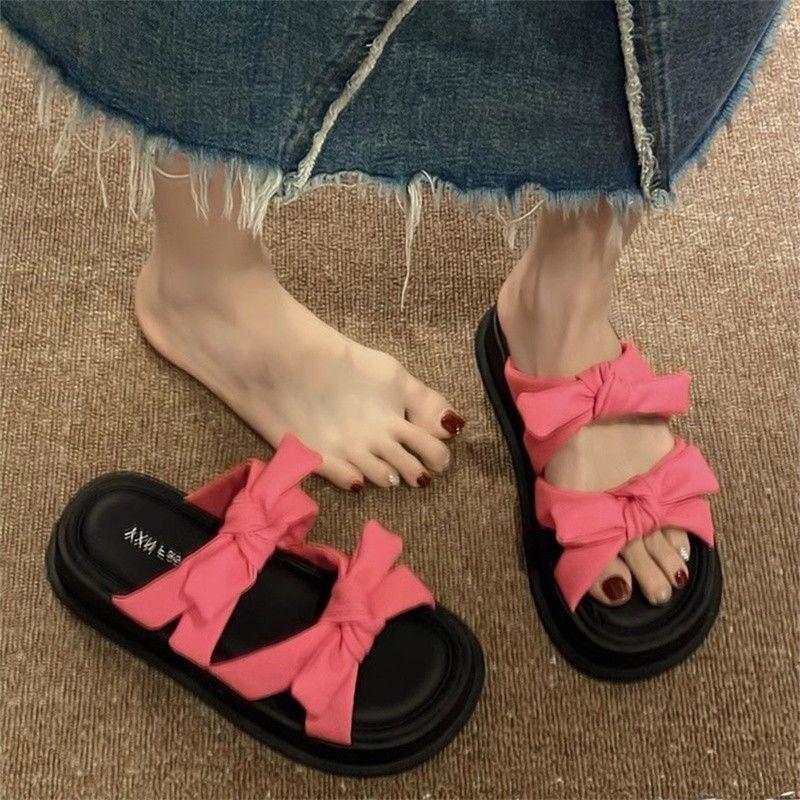 Thick-soled one-word slippers for women to wear summer new bows with skirts fashionable beach sandals