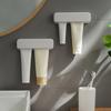 Anti-slip No-Drill Toothpaste Holder Punch Free Face Wash Storage Rack  Bathroom Organizer