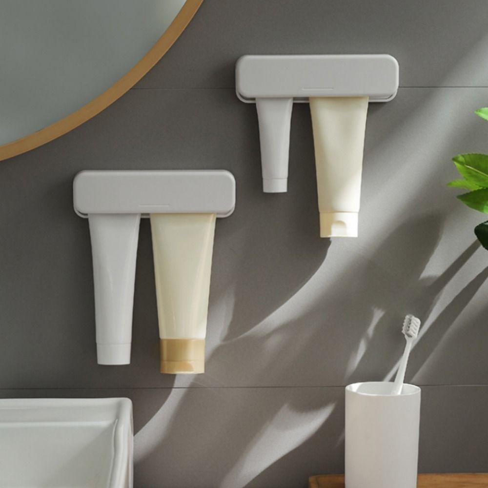 Anti-slip No-Drill Toothpaste Holder Punch Free Face Wash Storage Rack  Bathroom Organizer