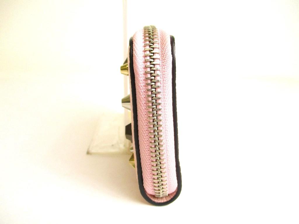 Porte-monnaie rond zippé en cuir rose clair Christian Louboutin authentique #9691 remis à neuf