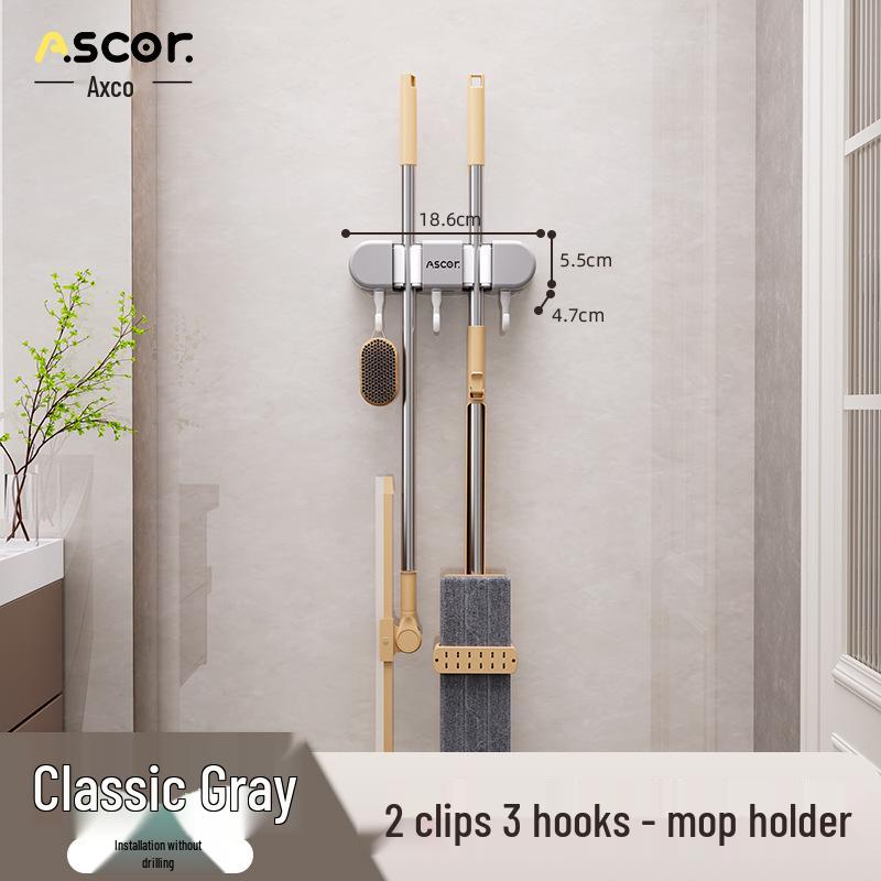 Wieszak ścienny na miotłę i mop: Rozwiązanie do zawieszania bez wiercenia na drzwiach łazienkowych lub toaletowych.