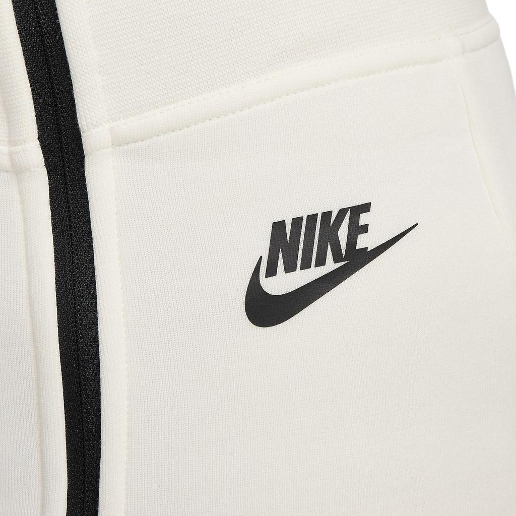 Nike Pantaloni Sportivi in Maglia a Righe Vita Alta Vestibilità Slim Fit Zip ai Polsini Donna Fondo Avorio FN7130-110