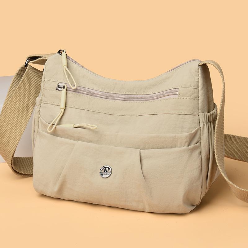 

Проста та легка маленька квадратна сумка через плече на одному ремені бежевий