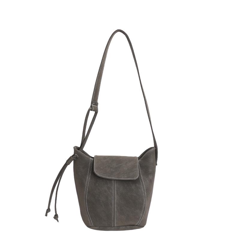

Simple bucket bag, versatile underarm bag, oneshoulder crossbody bag, women s niche autumn and winter texture new bag зелений