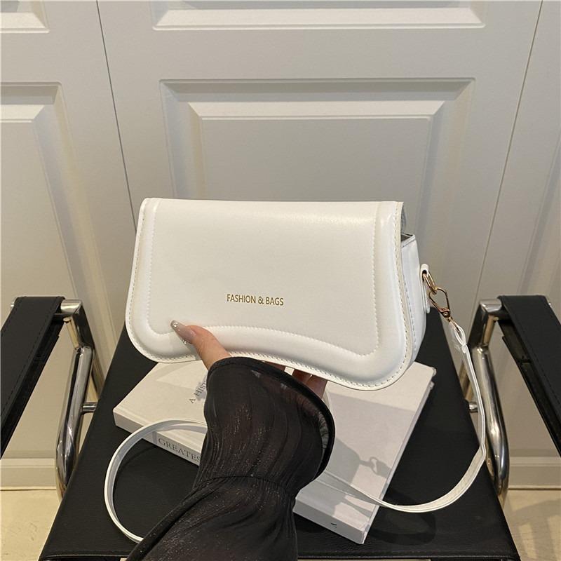 Textured hand-held underarm bag summer new fashion messenger bag solid color commuter retro shoulder bag women