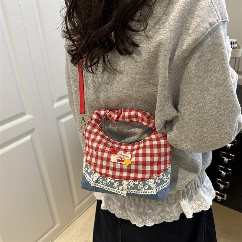 Niche design bow underarm bag women's handbag fashion shoulder messenger bag sweet baguette bag