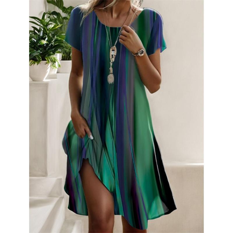 Sommerliches Kleid im künstlerischen Ethno-Stil mit Rundhalsausschnitt und mittlerer Länge
