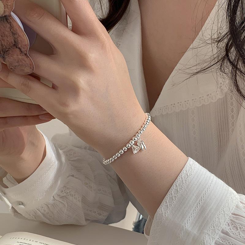 

Silver-Plated Lotus Pod Beaded Bracelet - New Chinese Style Light Luxury Gift for Women, Girlfriend, Qixi Birthday, or Special Occasion.