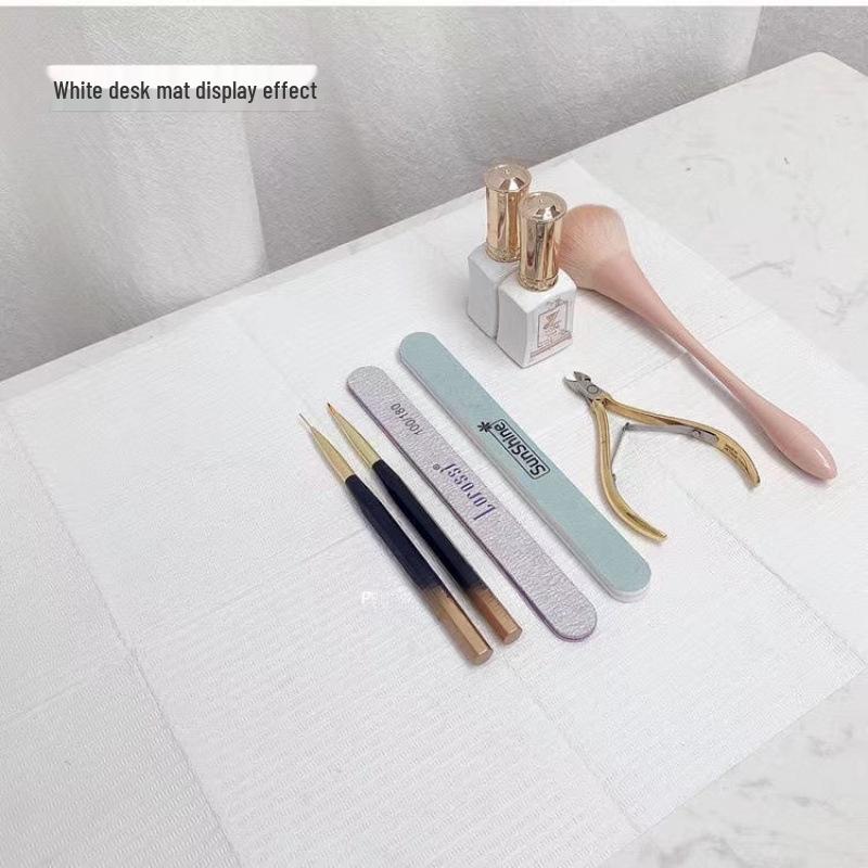Disposable Nail Art Table Mat - Waterproof, Stain-Proof, Water-Absorbing, Double-Sided Cleaning Pad for Japanese Nail Salon.