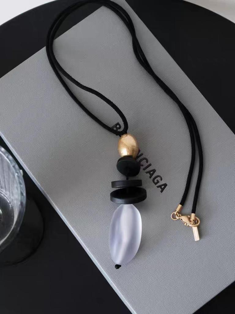 Elegant Ebony Wood Pendant Necklace with Black Cord – Versatile High-End Accessory for Women