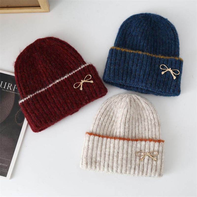 New autumn and winter women's bow knitted hat big head circumference thickened warm ear protector wool hat shows small face cold hat
