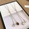 Tiger's eye stone water drop pulling necklace women's 1111 new popular light luxury niche design long sweater chain accessories