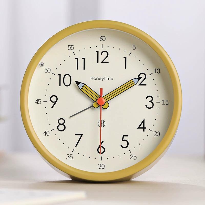 Simple and quiet small alarm clock, specially designed for students to get up and place on the bedside table