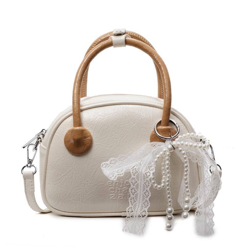 New product simple, fashionable and high-quality portable pillow bag women's spring and summer new product foreign style versatile casual messenger ba